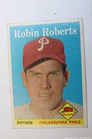 Front view of the 1958 Topps Robin Roberts baseball card showing player portrait and team details