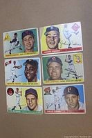 Front sides of 6 1955 Topps baseball cards showing player portraits, names, teams, and logos. Cards show signs of wear.