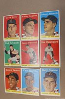 Front view of 9 1958 Topps San Francisco Giants baseball cards arranged in a grid showing portraits and team names.