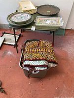 Table top displaying four serving trays and platter