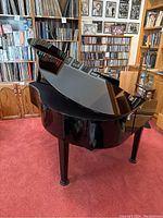 Front-side view of digital grand piano