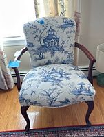 Front view of chair showing overall design and upholstery pattern