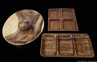 Three solid wood pieces: round covered dish with knob, square chip and dip dish with four compartments, rectangular tray with three compartments.