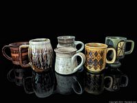 Front view of all 6 mugs showing diverse colors and decorative patterns