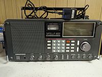 Front view of Grundig Satellit 800 with power cord draped over top