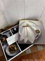 Photo of two large cooking books placed together showing the covers of The French Laundry Cookbook and Chanterelle.