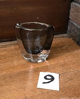 Side view of Orrefors Sommerso glass vase showing smoky inner layer and clear outer glass.