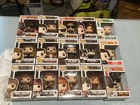 Multiple Funko Pop! boxes arranged on surface