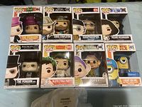 Full lot of eight boxed Funko Pop vinyl figures arranged in two rows.