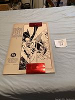 Front cover of George Perez Portfolio book showing comic-style illustration featuring Batman and another character in black and white line art style.