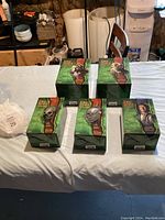 All five bust boxes arranged on table