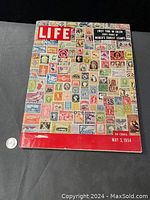 Front cover of the May 3, 1954 Life magazine with colorful rare stamps and publication details