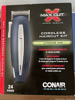 Photo of the Conair Max Cut cordless haircut kit box showing 24 pieces, lithium-ion battery, and rapid charge info.