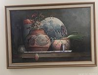 Full view of the oil painting showing vases, basket, and flowers on table.