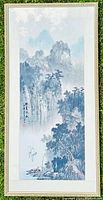 Full framed watercolour painting on silk depicting a vertical nature scene with mountains and waterfalls.