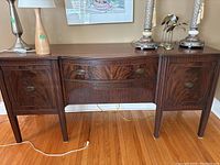 Full front view showing serpentine design and overall form