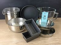 All items in the baking lot shown together including pans, bowls, and canister