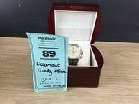 Oceanaut Catalina quartz watch displayed inside its original dark wood watch box with cream lining, with seller lot tag shown.