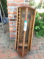 Top down view showing interior compartments, handle, and multiple round holes on one side.