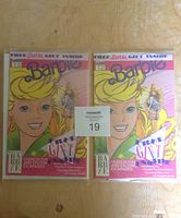 Front of two unopened 1991 Barbie comic books with Barbie illustration and free gift callout