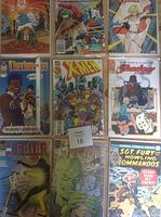 Front cover view of 9 comic books including Wolverine, Thor, X-Men, The Shadow Strikes!, Legion '90, Sgt. Fury & His Howling Commandos