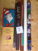 Collection of 2 themed empty notebooks and 5 rolled vintage posters.