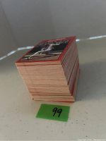 Side view of a stack of 1990 Donruss baseball cards showing the card edges and thickness of the stack indicating approximately 175 cards.