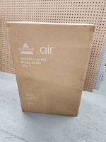 Front view of the unopened Bissell Air 400 Air Purifier cardboard box showing model and quantity details.