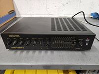 Front view of Bogen Gold Seal Series Power Amplifier showing all control knobs and power switch.