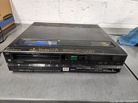 Front view of Sony Super Beta Hi-Fi SL-HF400 Betamax video cassette recorder displaying buttons, cassette slot, and branding.