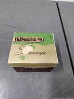 View-Master original box top side showing branding and wear.