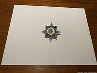 Front view of the USSR service medal showing the layered star design with silver, brass, and blue enamel.