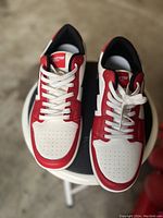 Pair of men's Rockstar original sneakers placed side by side showing top view with laces tied.