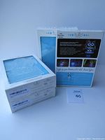 Three boxed Tuliu Owl Night Lights stacked together with a white background. Boxes show front and back packaging with branding and illustrations.