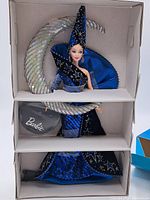 Full view of Moon Goddess Barbie doll in original box with crescent moon accessory visible.