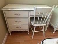 Front view of desk with chair