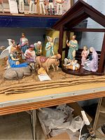 Full shelf view showing all figurines and stable.