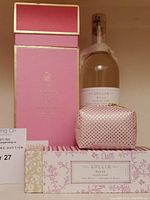 Overview of all items including Reed Diffuser box, Foaming Bath bottle, Hand Cream tube, and cosmetic pouch.