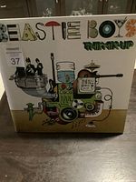 Front view of the Beastie Boys The Mix Up double LP album cover showing colorful illustration and band name