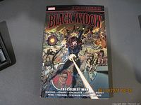 Front cover photo of Marvel Black Widow graphic novel The Coldest War showing title, artwork, and credits.