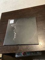 Front cover of album with profile image of Nathaniel Rateliff in black and white on a black background.