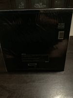 Back cover of the Nine Inch Nails LP sealed vinyl record showing catalog number, barcode, and production credits.