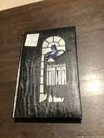 Front cover of the hardcover book showing the Batman illustration and the title.