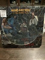 Front view of The Who 'Who Are You' LP record album cover, showing band photo and title text