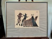 Full view of framed print showing matting and frame