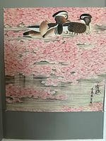 Open view of a signed Chinese watercolour painting featuring two ducks and pink cherry blossoms.