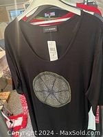 Black short-sleeve t-shirt with rhinestone basketball design front, brand new with tags, size L/XL.