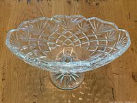 Top view showing the detailed cut pattern and oval scalloped shape of the Waterford Marquis pedestal dish.