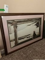 Full view of the framed Wyeth print leaning against a wall.