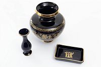 Three cobalt blue porcelain pieces including a large vase, small vase, and ring tray with gold decoration